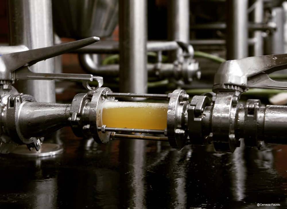 How are steam boilers used in beer breweries